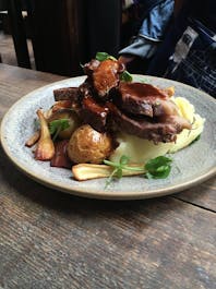 L. Mulligan. Grocer.